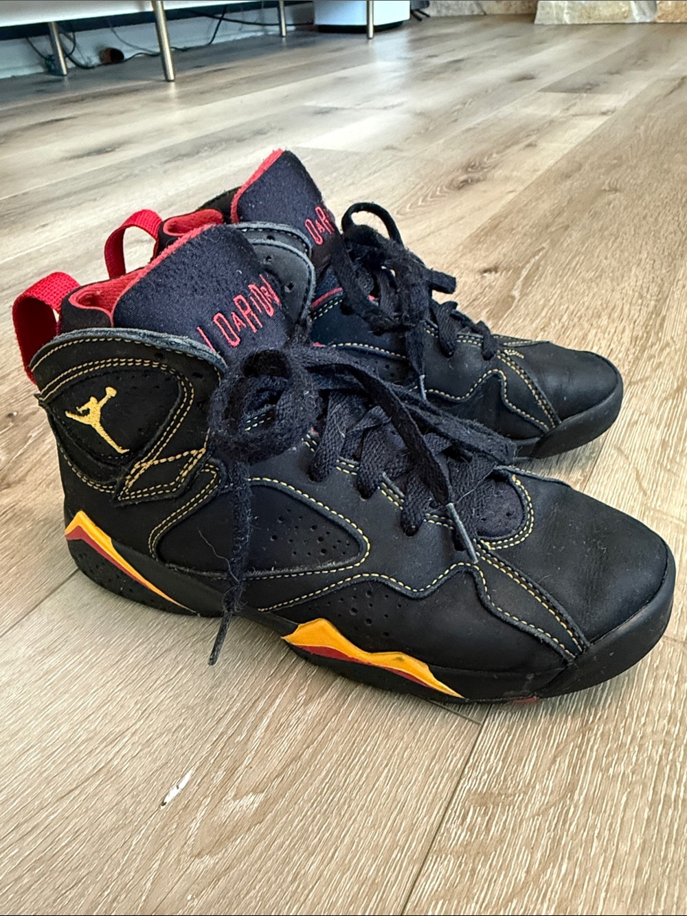 Jordan Kids Black High-Top Sneakers with Red and Yellow Accents Size 4Y